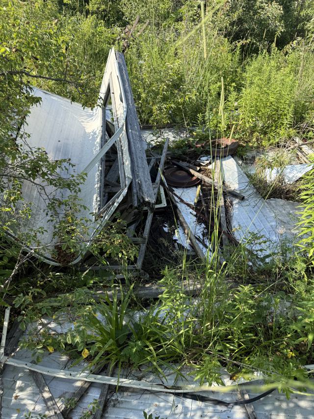 Collapsed derelict trailer