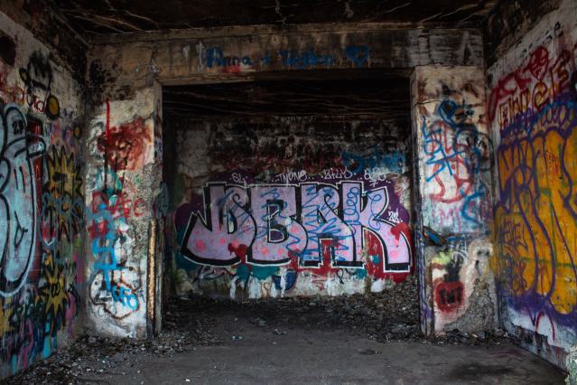 Interior covered in graffiti