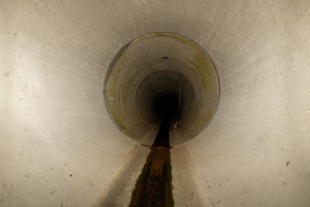 Inside the drain, taken through the grate