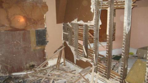 Stucco - Trashed-(near-Holly)18.jpg