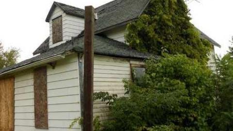 Highway 93 Boarded Up House photo 4